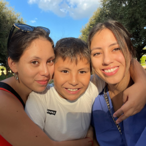 Marife with her brother and sister.