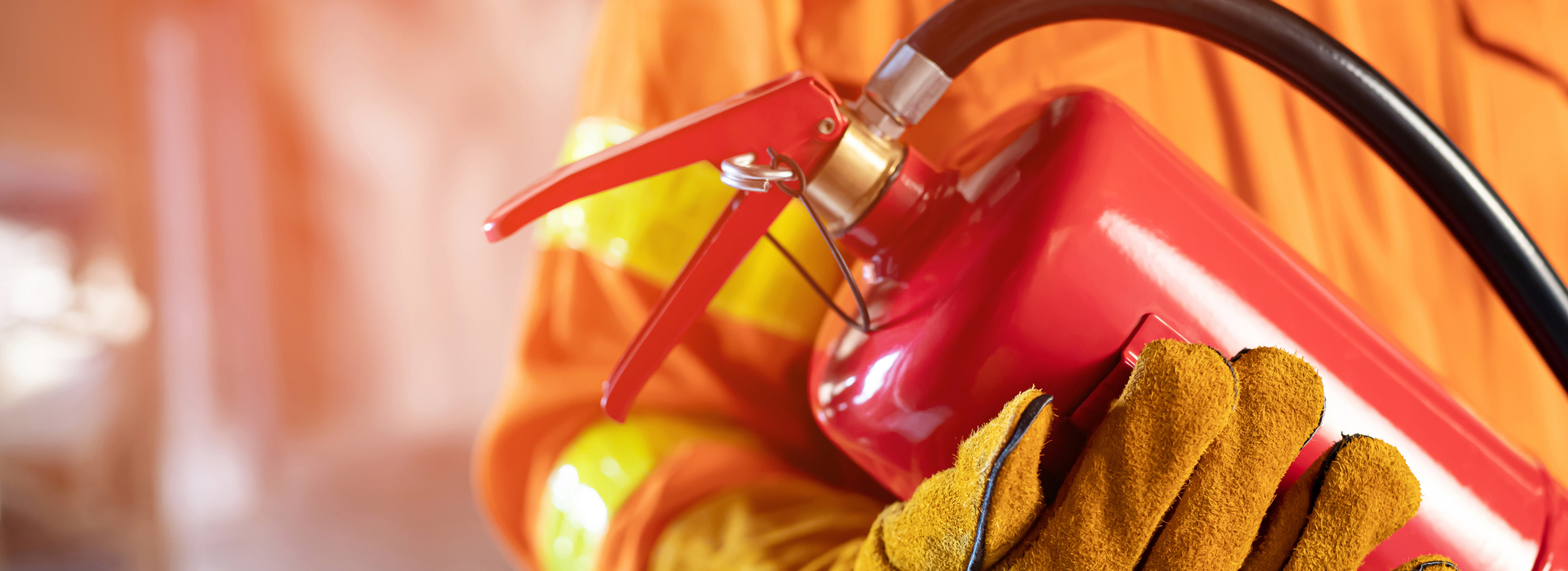 fire protective systems case study firefighter holding a fire extinguisher