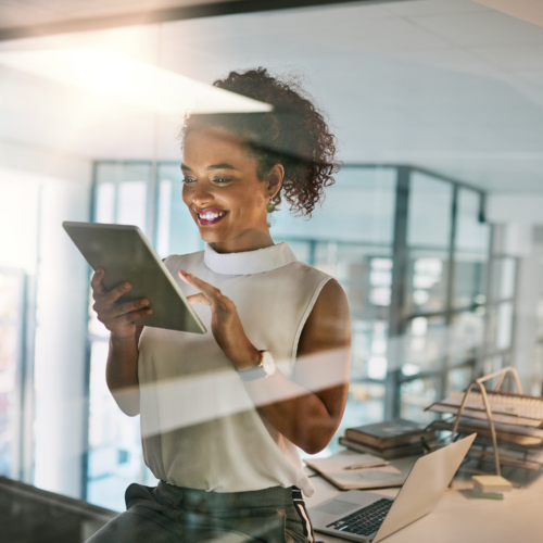 Black Woman Using Tech